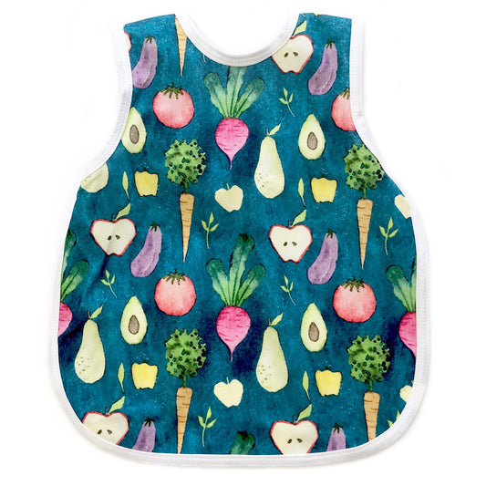 A cute baby bib/apron with a watercolour vegetable pattern