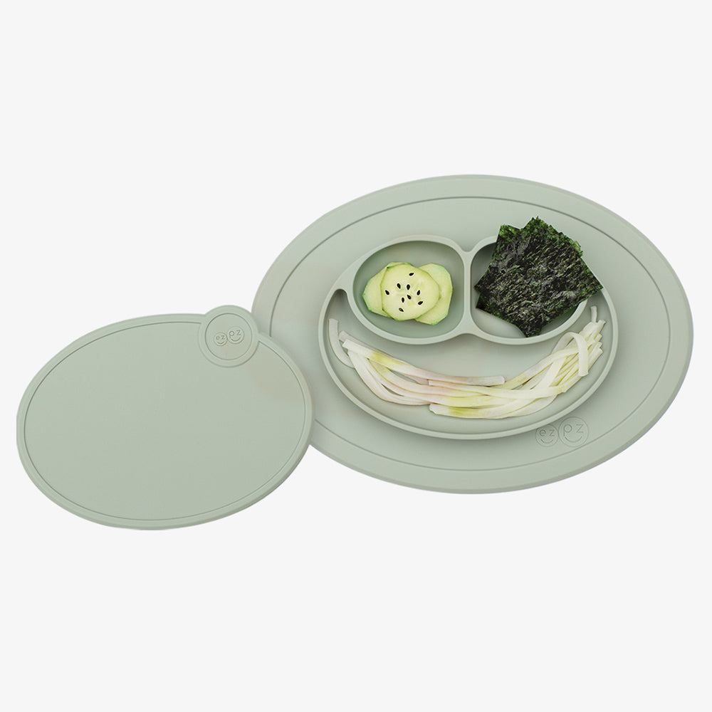 ezpz mini mat and lid in sage with snacks