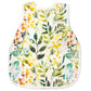 A bapron baby apron in a white with leaves pattern called 'autumn leaves'