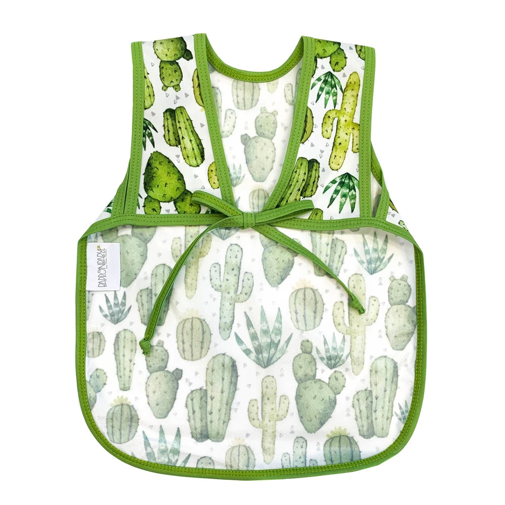 The back of a bapron bib showing the ties in desert cactus pattern